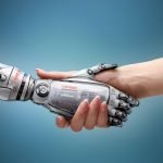 Female,Human,And,Robot's,Handshake,As,A,Symbol,Of,Connection