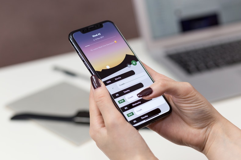 a girl using his mobile app