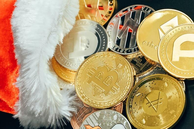 bitcoin on a red cloth with other coins