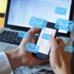 email marketing concept, person reading e-mail on smartphone, re