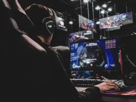 person sitting on gaming chair while playing video game. How Can You Play Warzone 3